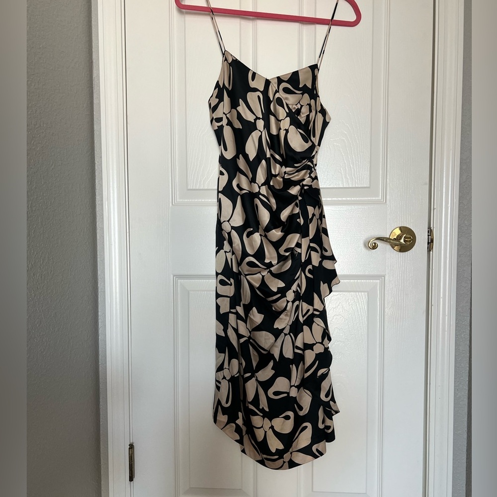 A silk Valentino dress  Purchased in 2012.